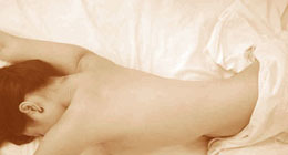 Nude_lying_facedown_on_bed260